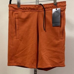 Motion Men's Performance Shorts in Burnt Orange